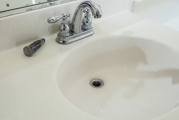 master sink drain out on counter