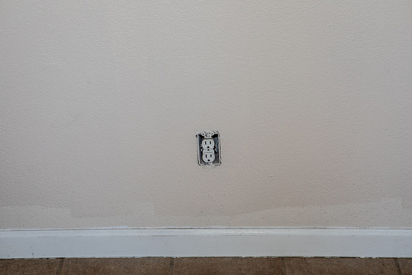See the bottom and around the outlet - where it was painted shows different color, replace plate
